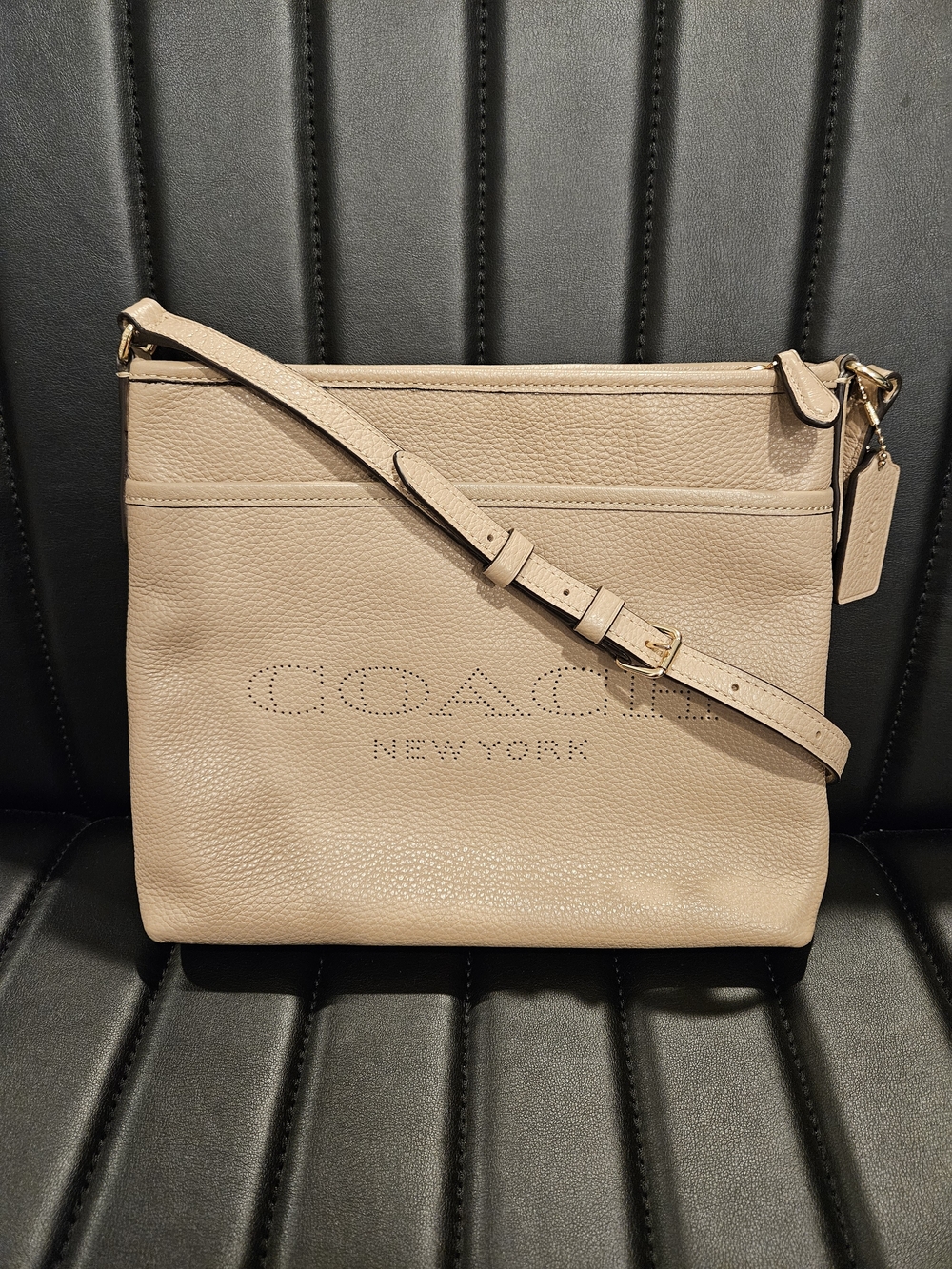 Coach Kitt Perforated New York Beige Leather Crossbody Bag